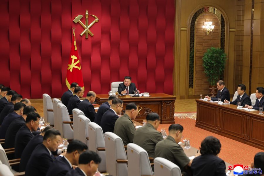 North Korean leader Kim Jong-un is seated in a room with other North Korean leaders, according to KCNA.